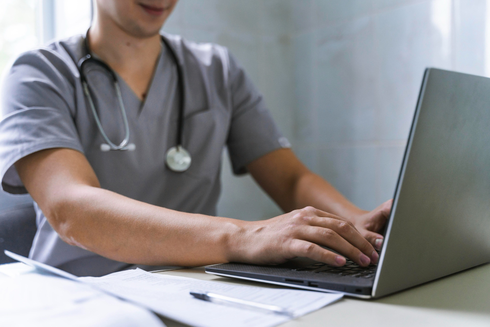 nurse using a laptop