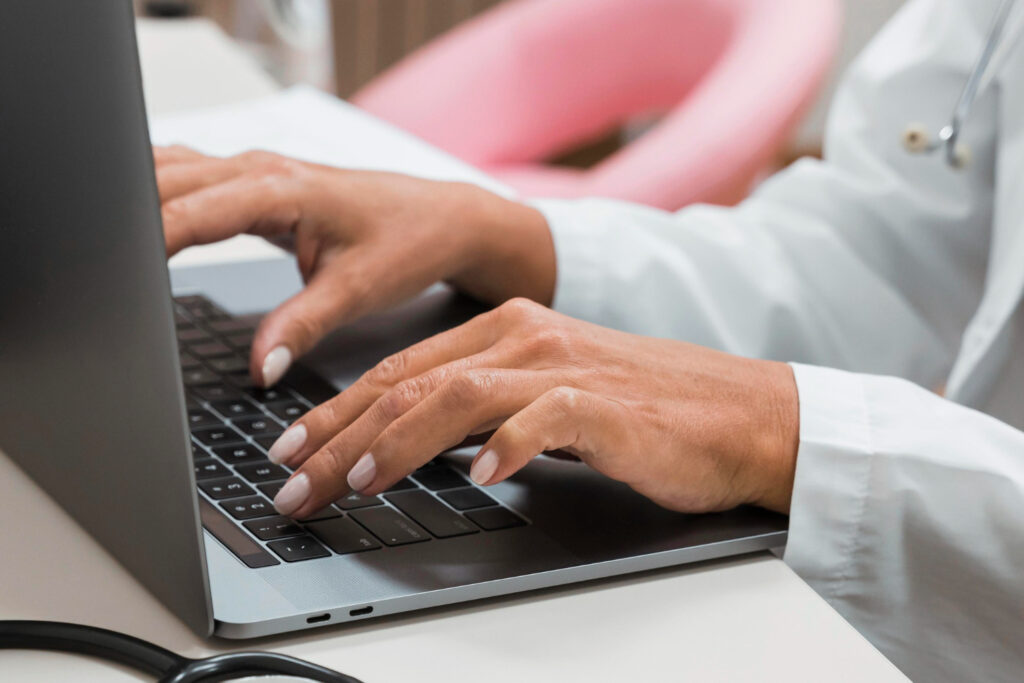 woman suing a laptop